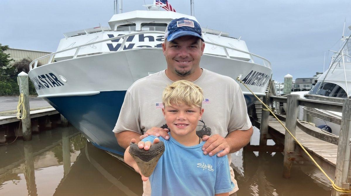 d3ae768a-boy-with-megalodon-tooth-new-jersey-beach-1200x670